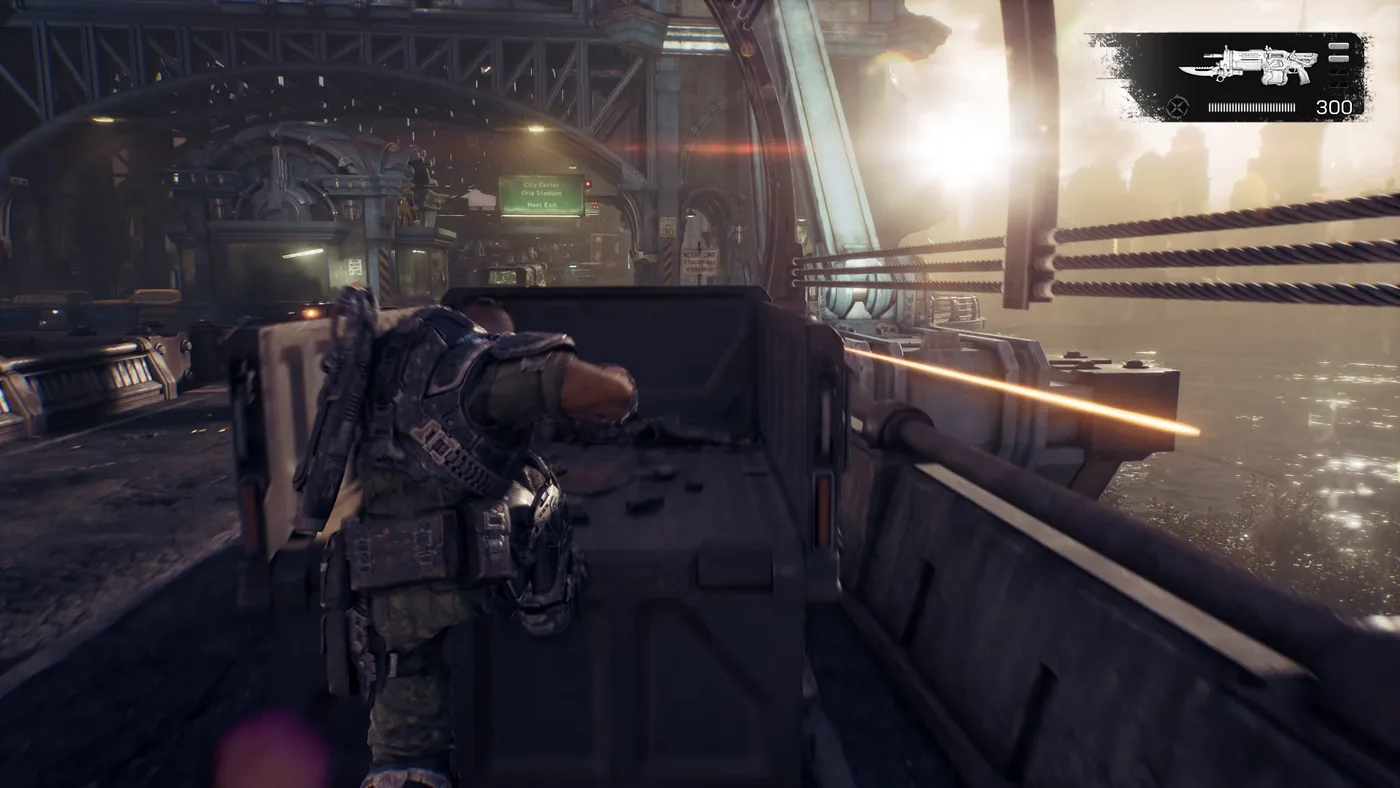 Soldado parapetado tras una cobertura disparando en un interior monumental de Gears of War: E-Day