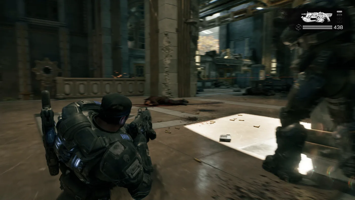 Dos soldados compartiendo la misma cobertura mientras disparan en Gears of War: E-Day