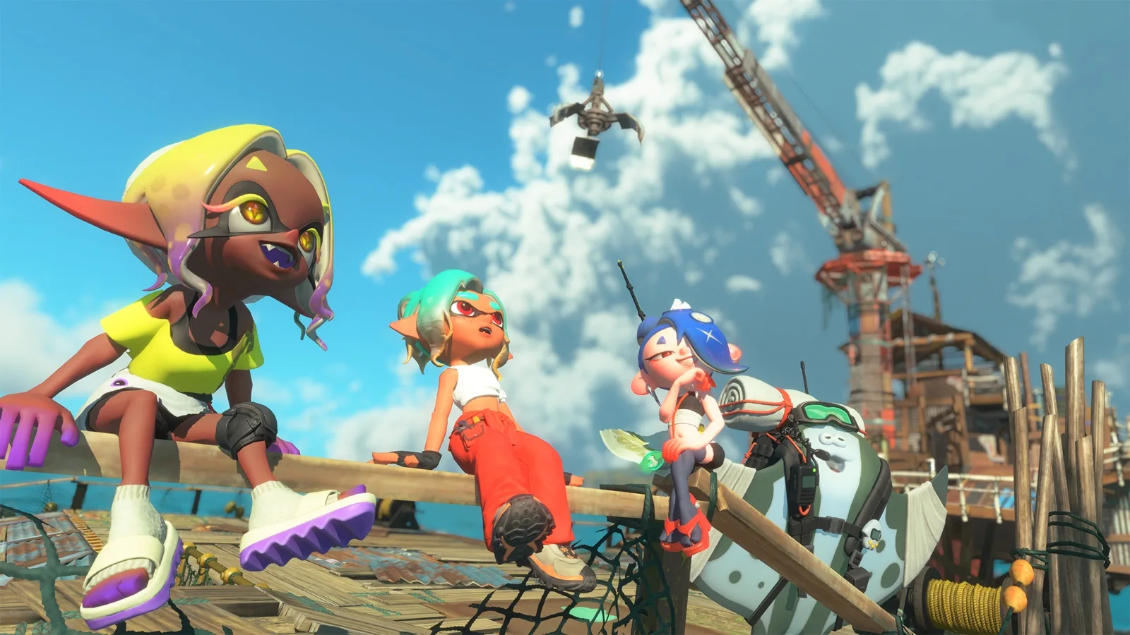 Los personajes de Deep Cut sentados sobre una estructura de madera en un muelle en Splatoon Raiders